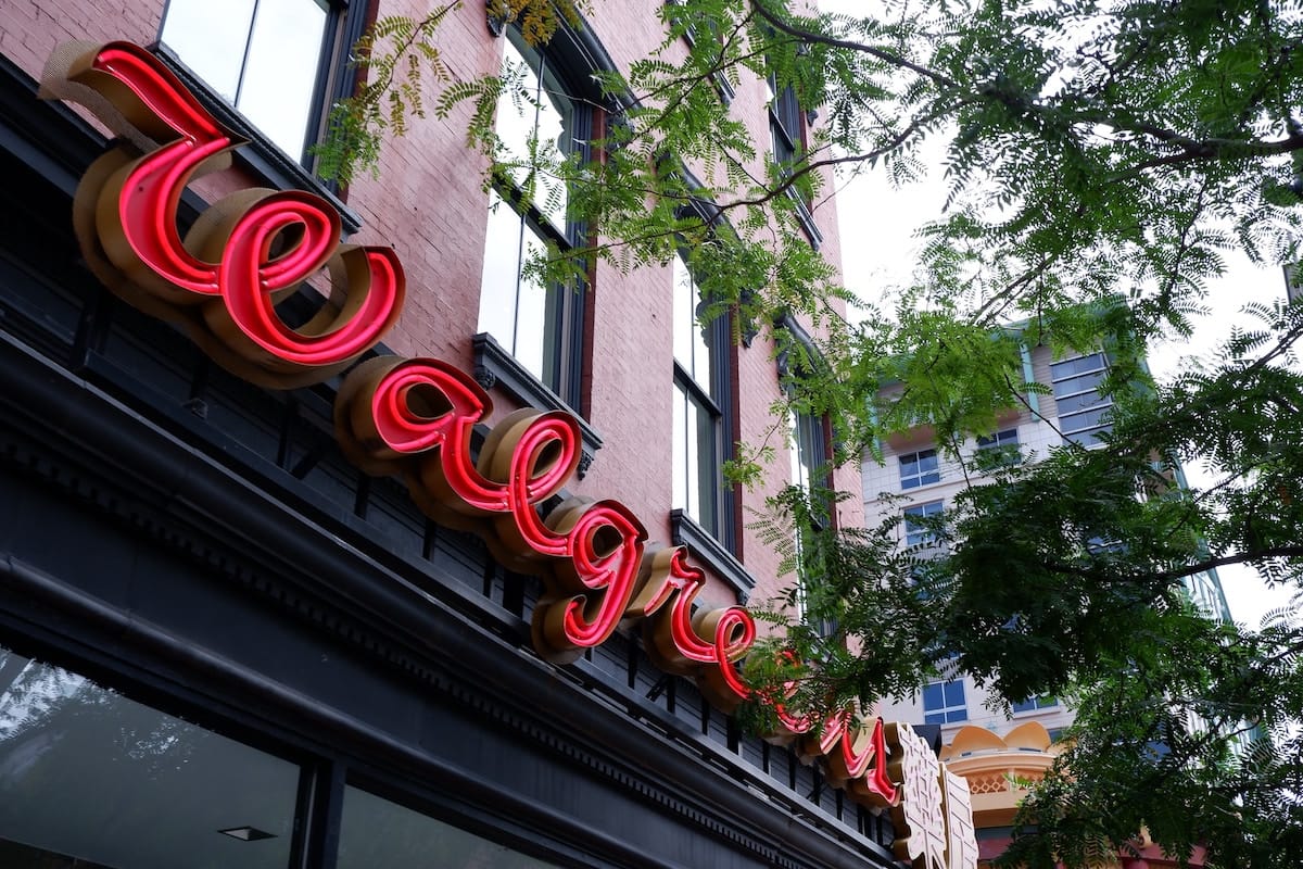 walgreens storefront in a busy city